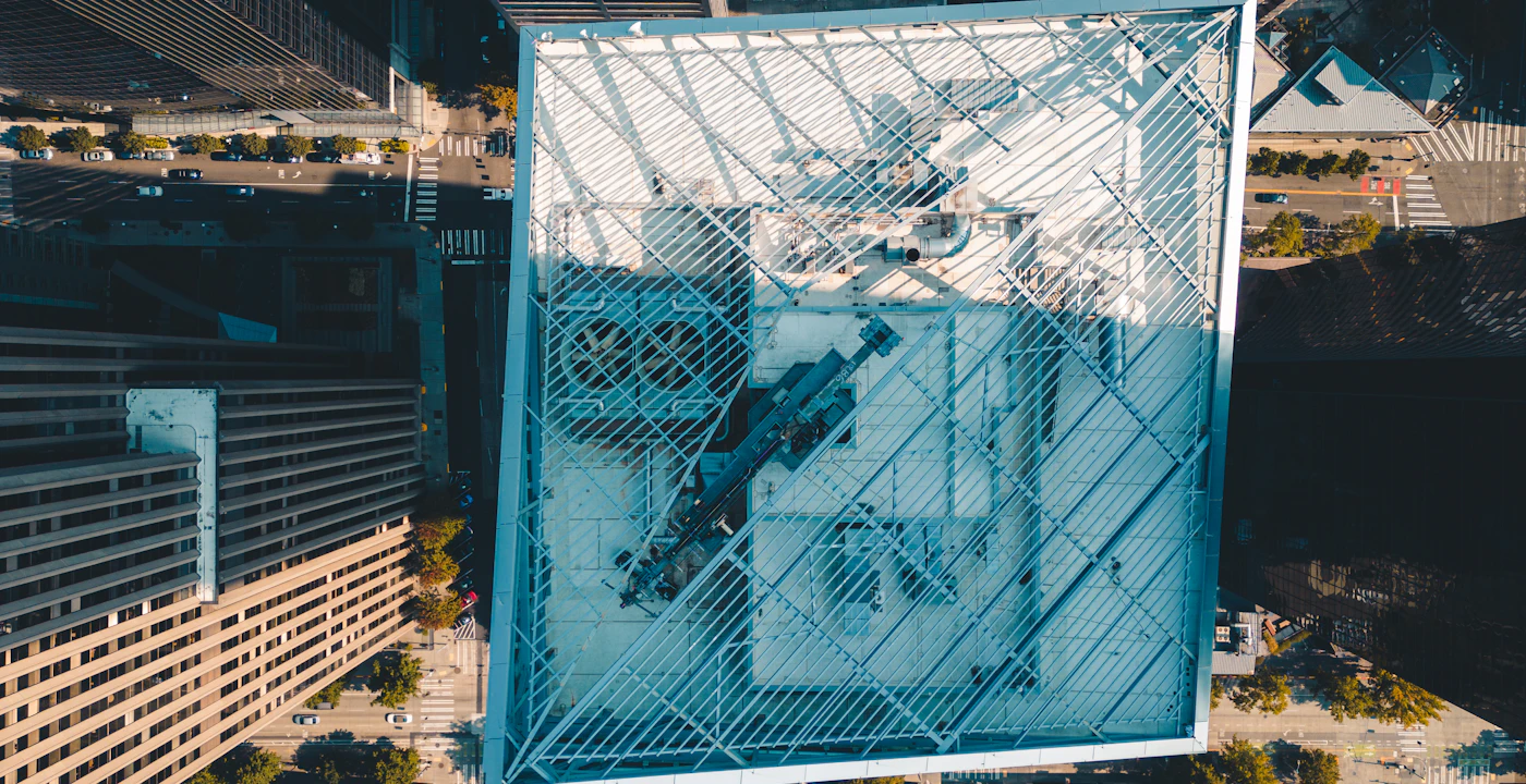 Aerial view of a high-rise roof with the site boundary outlined